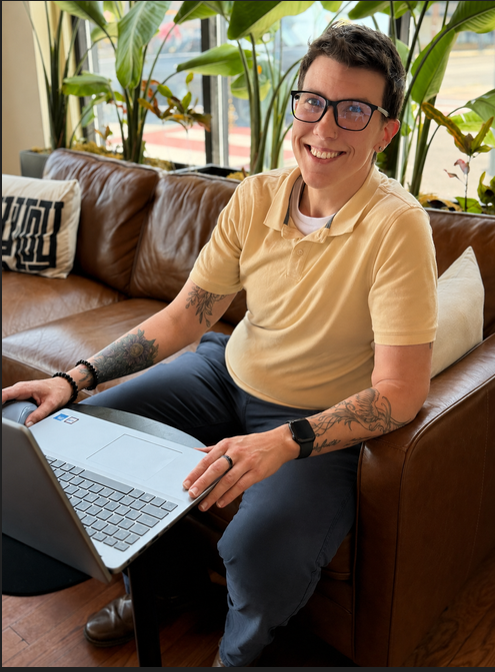 Karissa Bentley, business operations consultant and founder of InsideOut Strategic Growth Co., working on a laptop