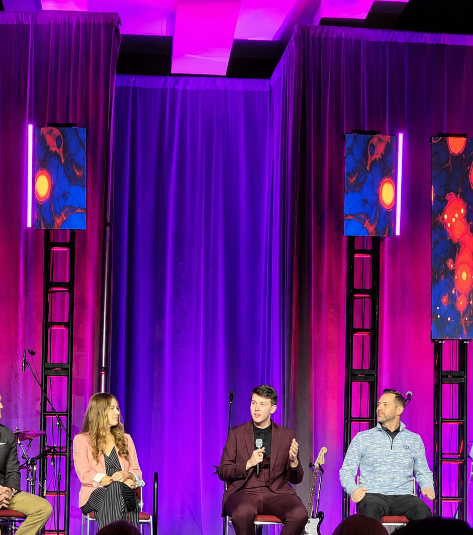 Karissa Bentley speaking during a business performance panel