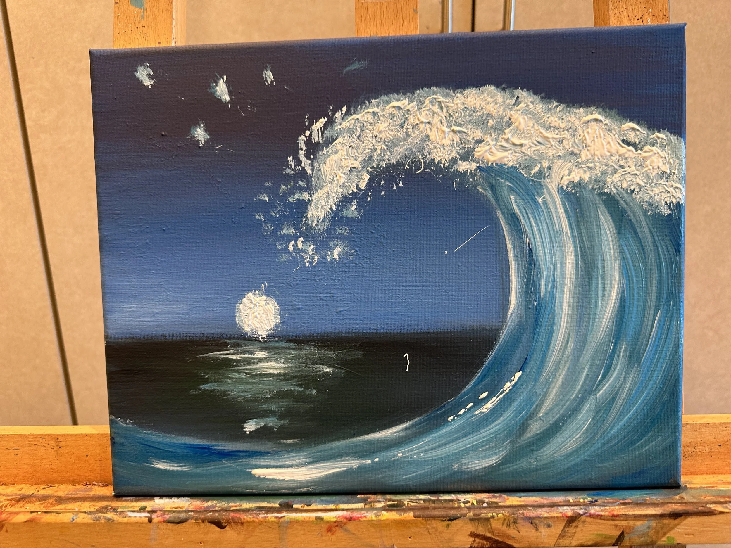 A painting of a large ocean wave at dusk, with a full moon reflecting on the water and a star visible in the sky.