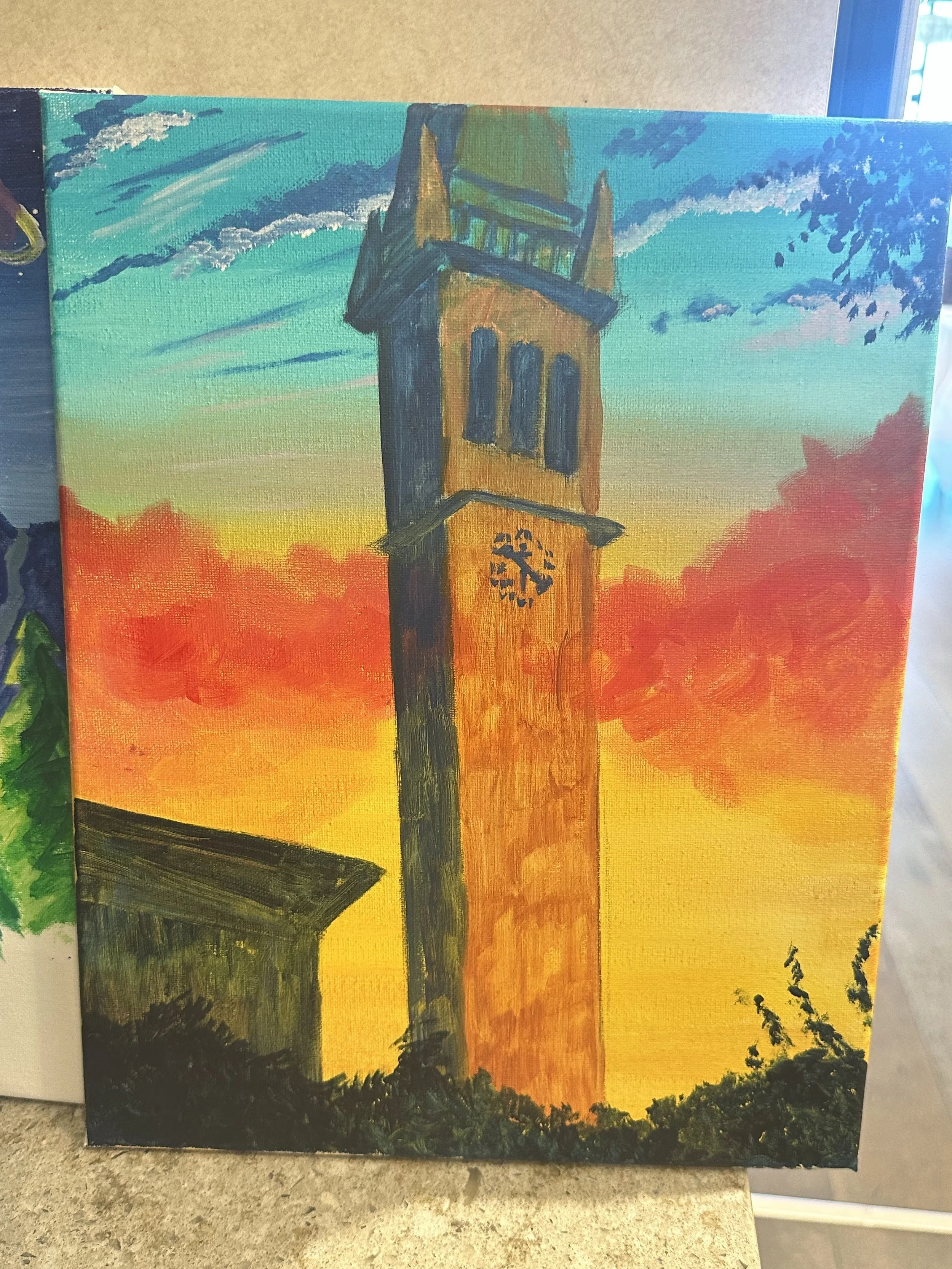 Painting of a clock tower during sunset with a colorful sky of blue, green, yellow, orange, and red hues.