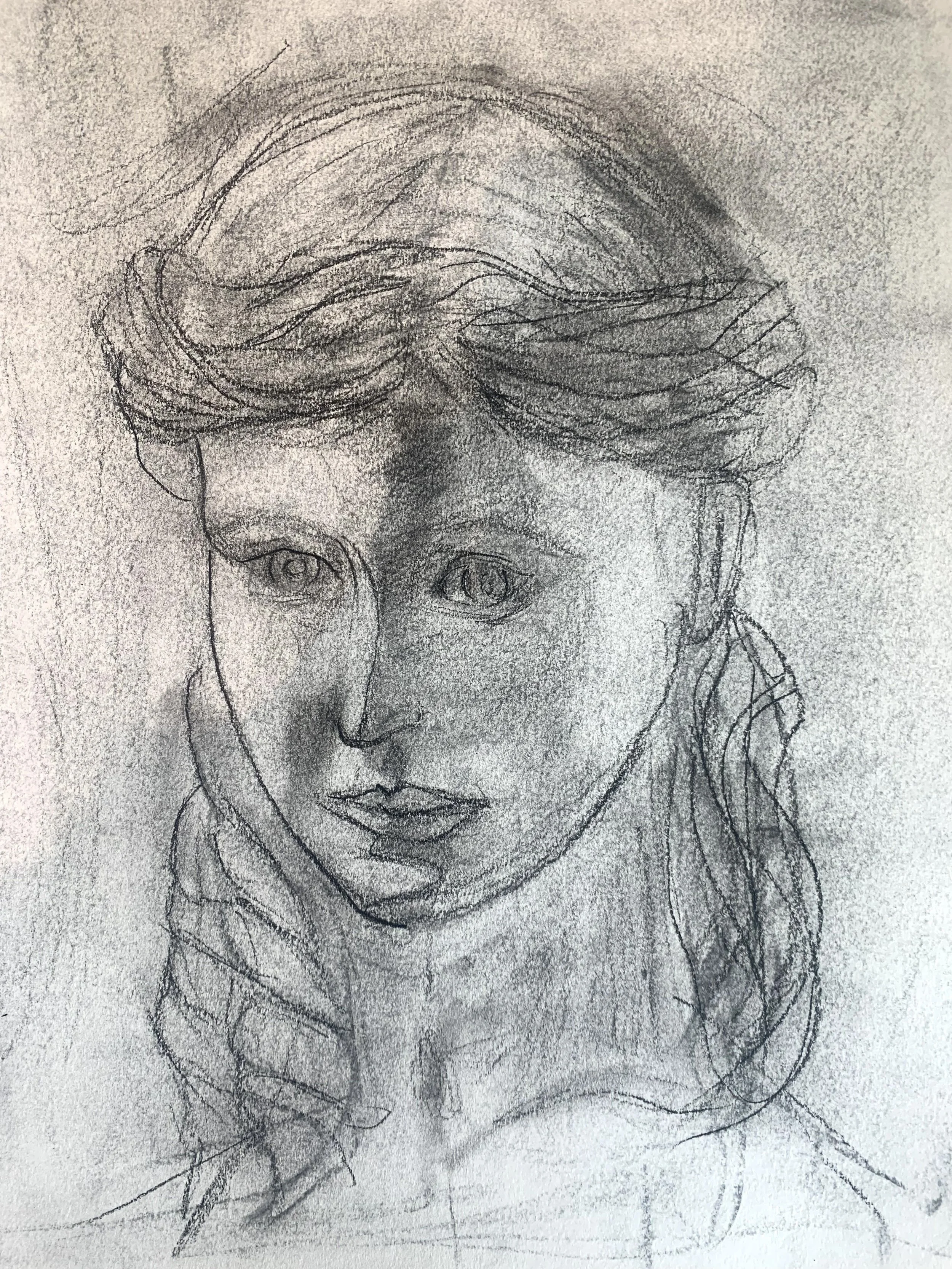 A pencil sketch of a woman with wavy hair, large eyes, and full lips.