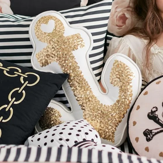 the-emily-meritt-gold-anchor-pillow-c.jpg