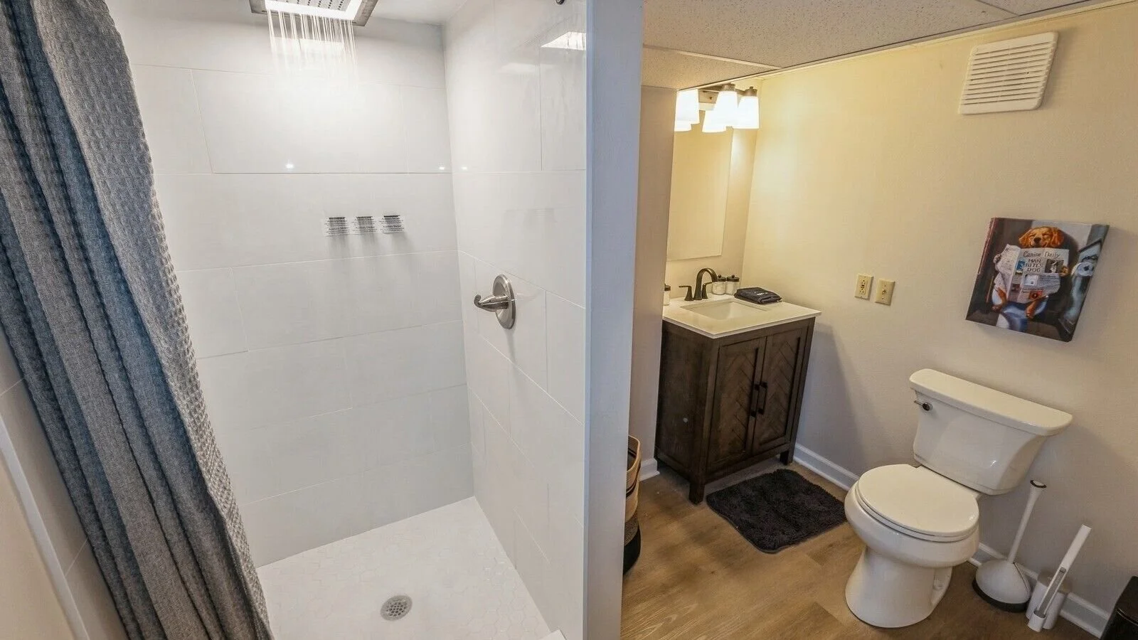 Lower-level full bathroom with rain shower.  Towels provided!