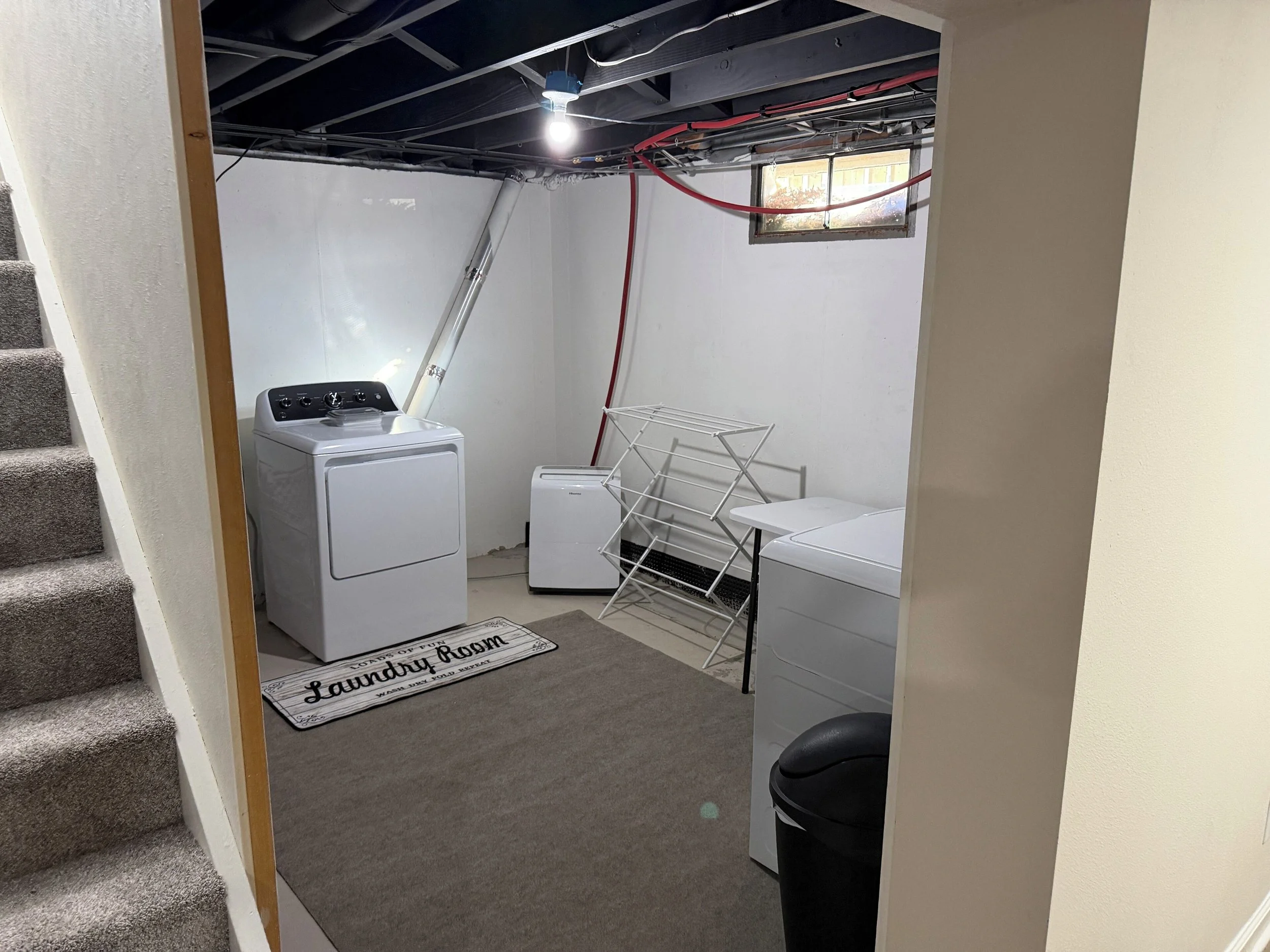 Laundry room: new full-sized washer & dryer, ideal for extended stays and work crews