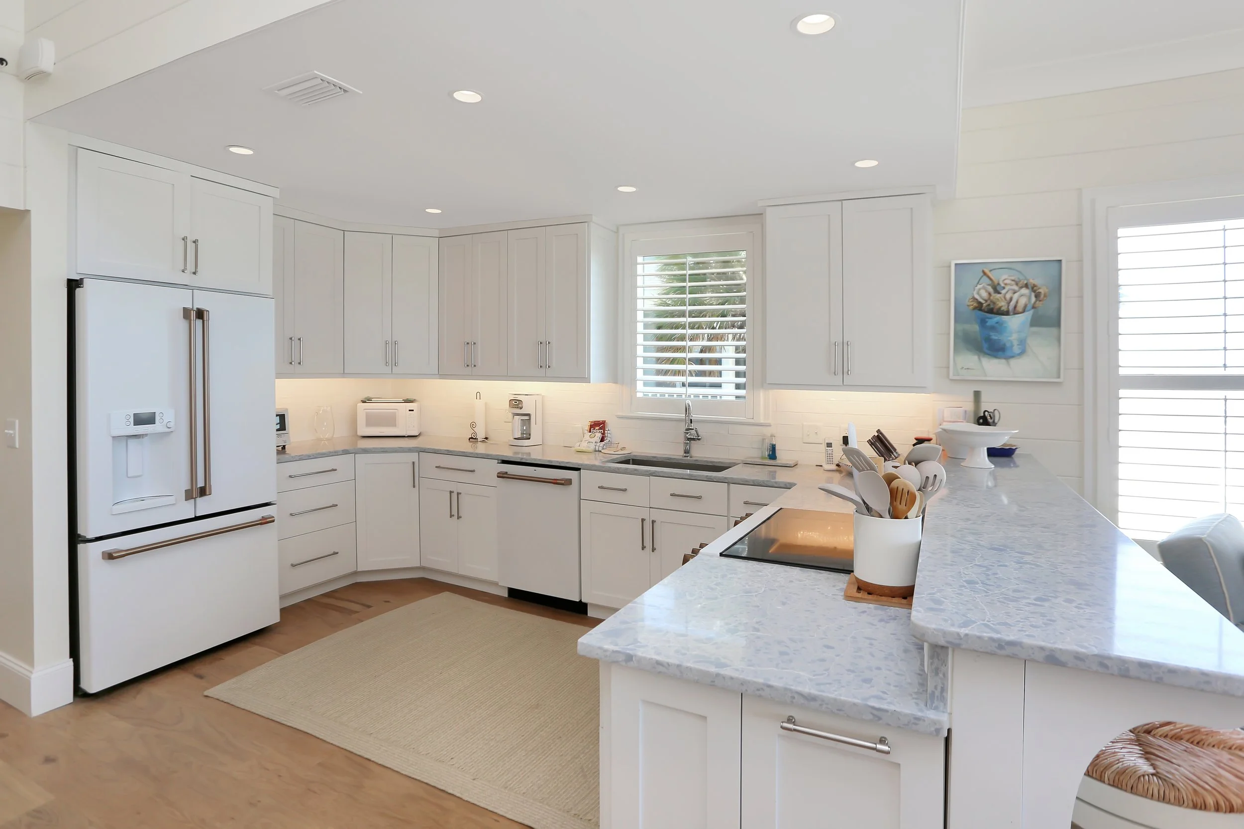 South side kitchen with GE Cafe' appliances and fully stocked