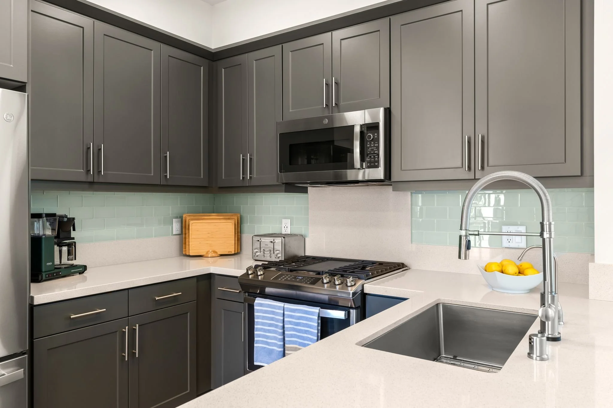 1276 E. Thompson Blvd., #101, Ventura, CA 93001 Modern & Stylish Kitchen with Quartz Counters and Sea Glass Backsplash Plus Pantry