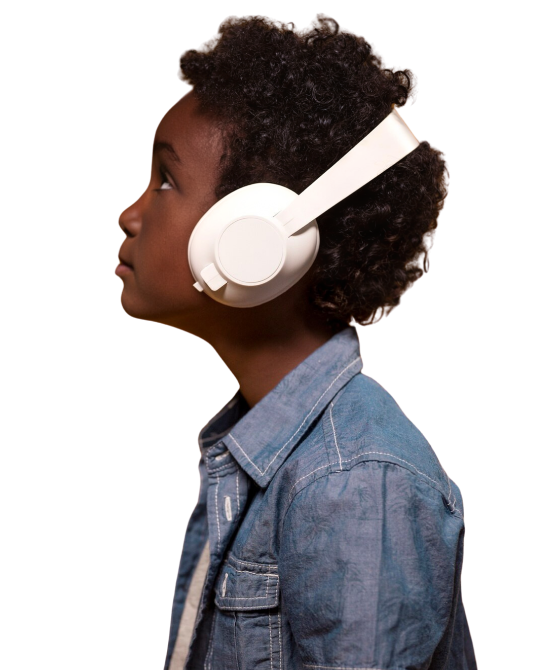 Child with curly hair wearing a denim jacket and listening to white headphones.