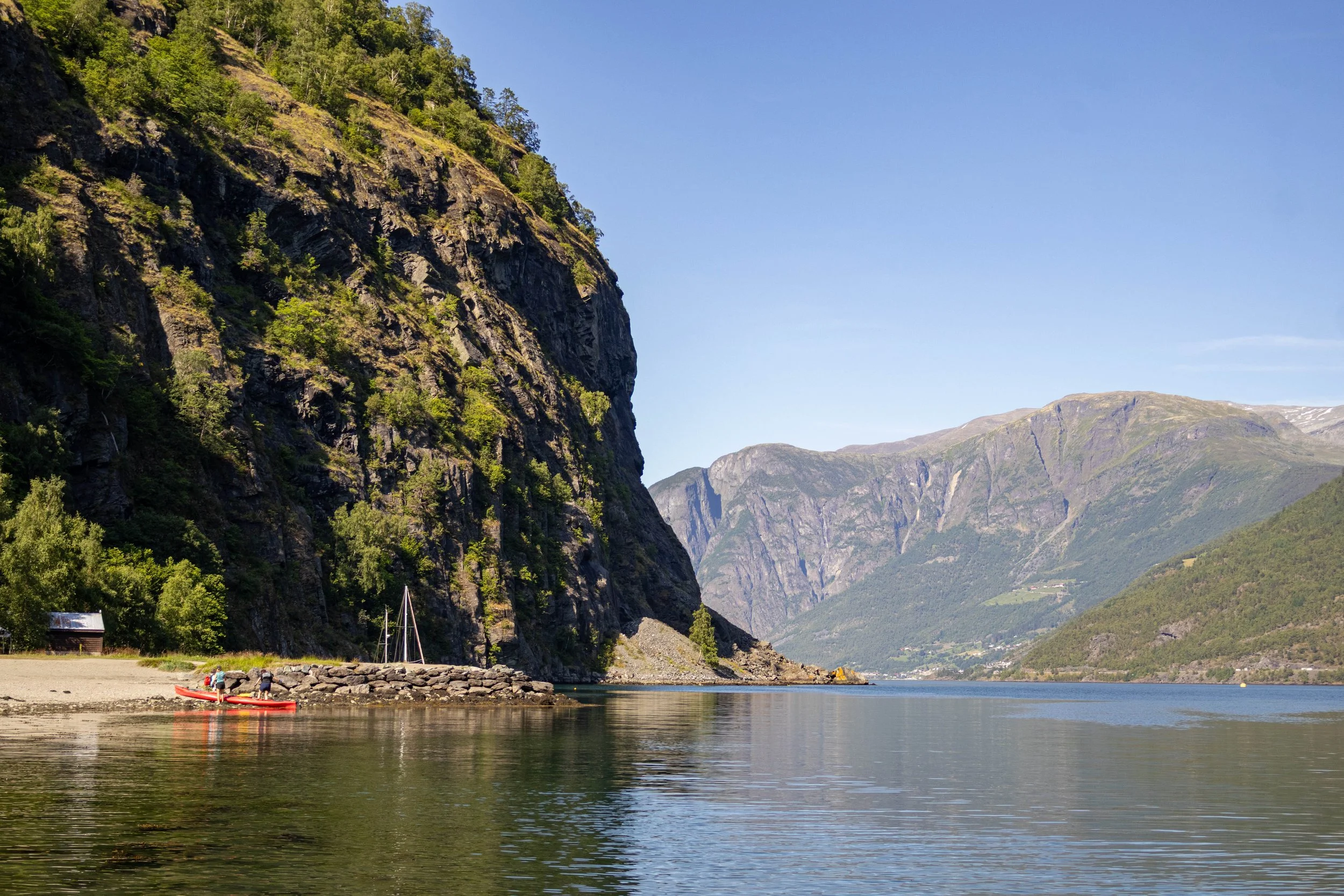 Kayaks on the beach in Flåm