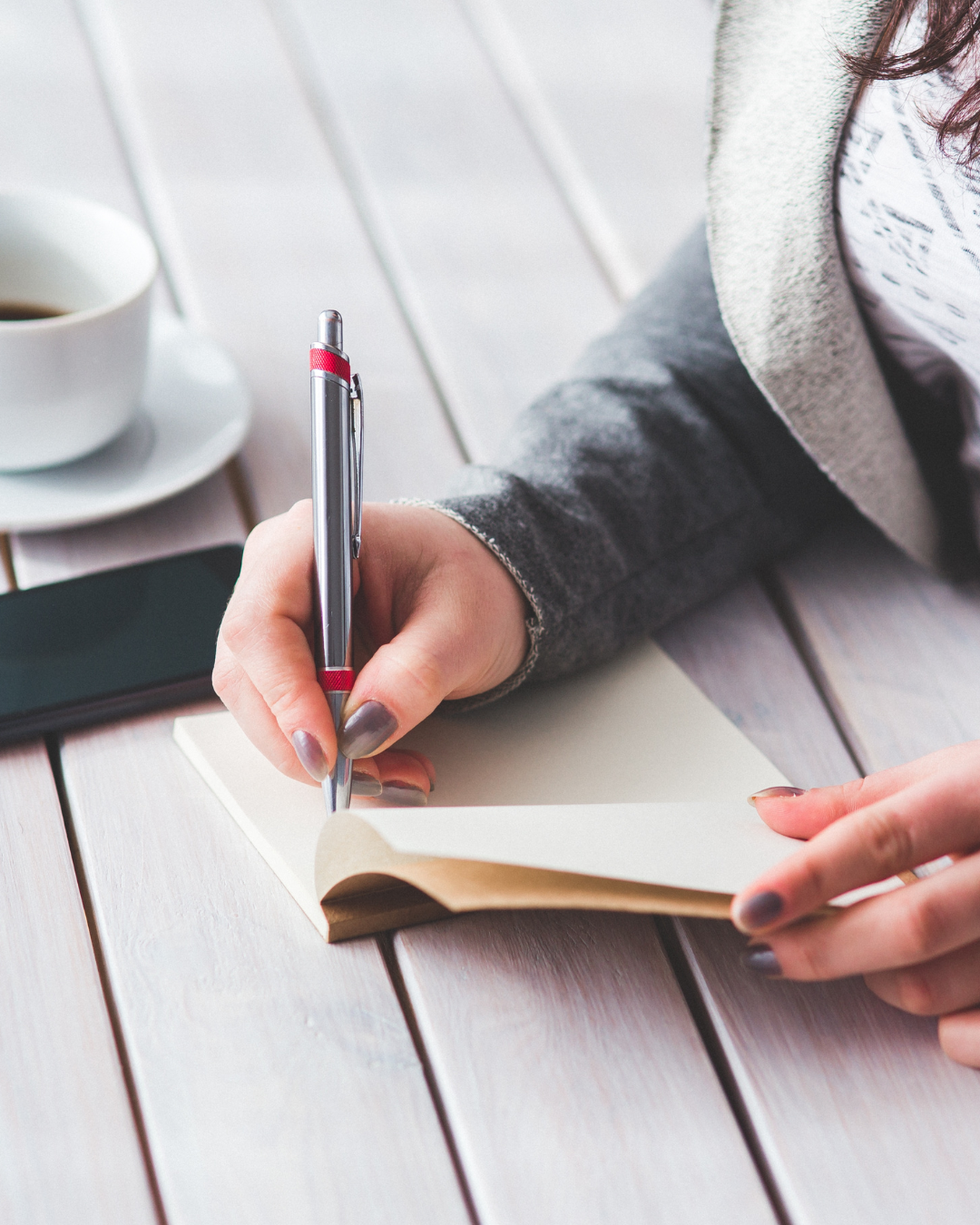 journal is open ready to capture her thoughts.