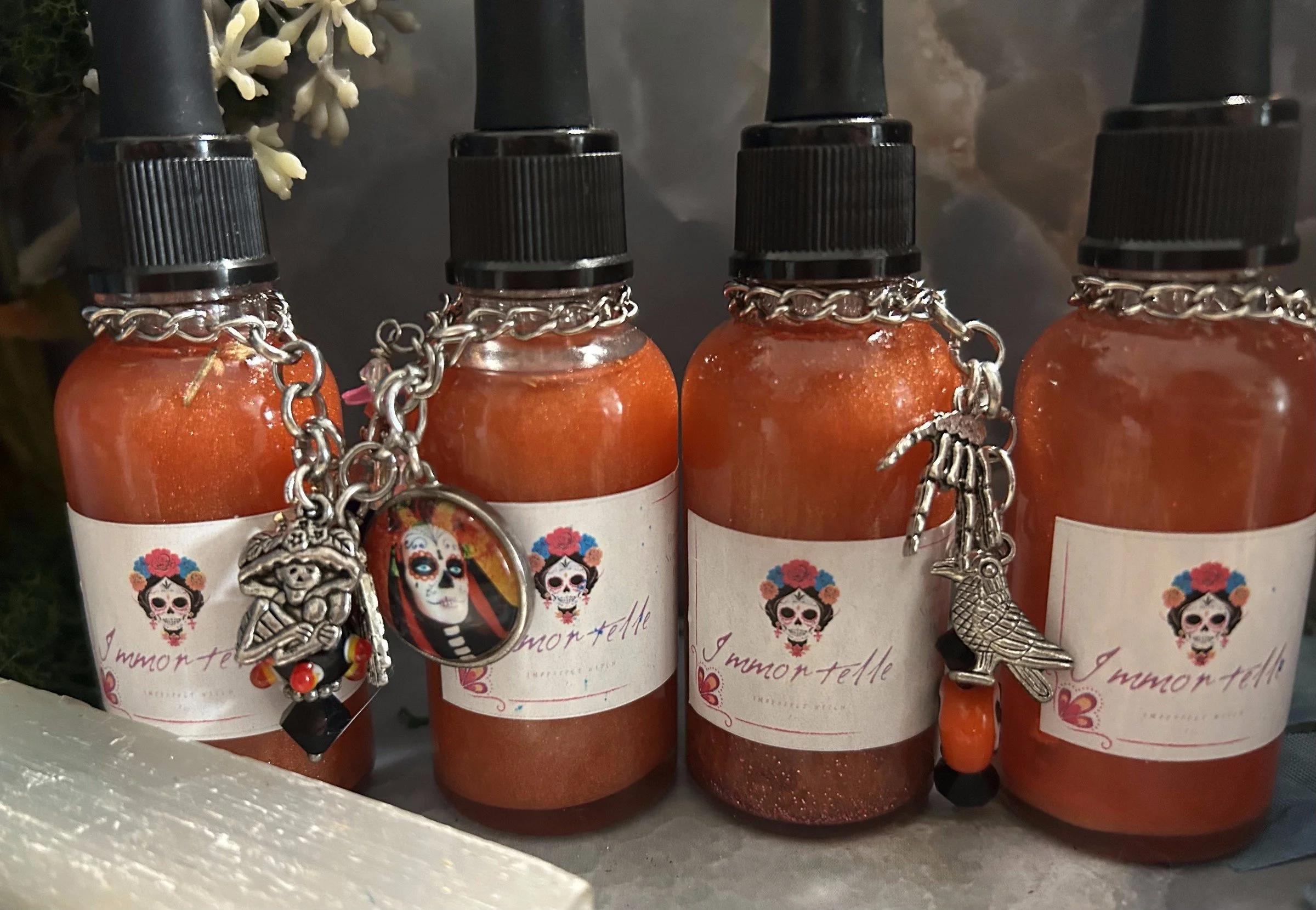 1 immortelle four bottles.jpg