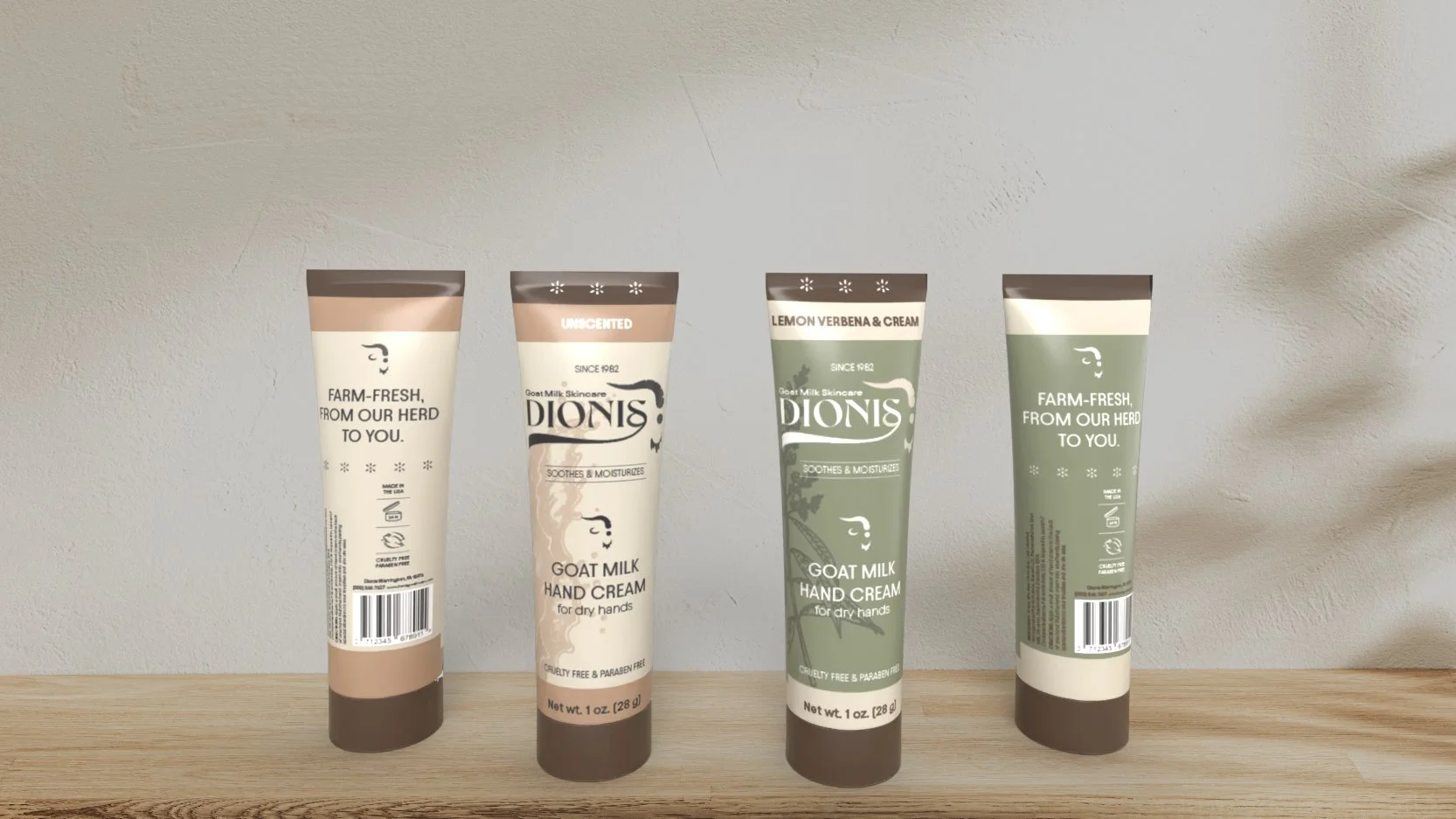 Four tubes of Dionis goat milk hand cream in different flavors standing upright on a wooden surface against a white wall.