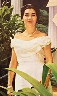 Eva Ninia Storrs (née King), 1962, representing the Daughters of Hawaiʻi at Queen Emma Summer Palace.