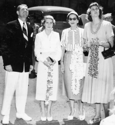Hon. John Parks III with Georgiana, Beth, and Kate Parks waiting for (brother) Captain Lewis Parks (USN) to descend from the USS Manchester docked at Pearl Harbor, 1951. Photo courtesy of the Harry S. Truman Library and Museum.