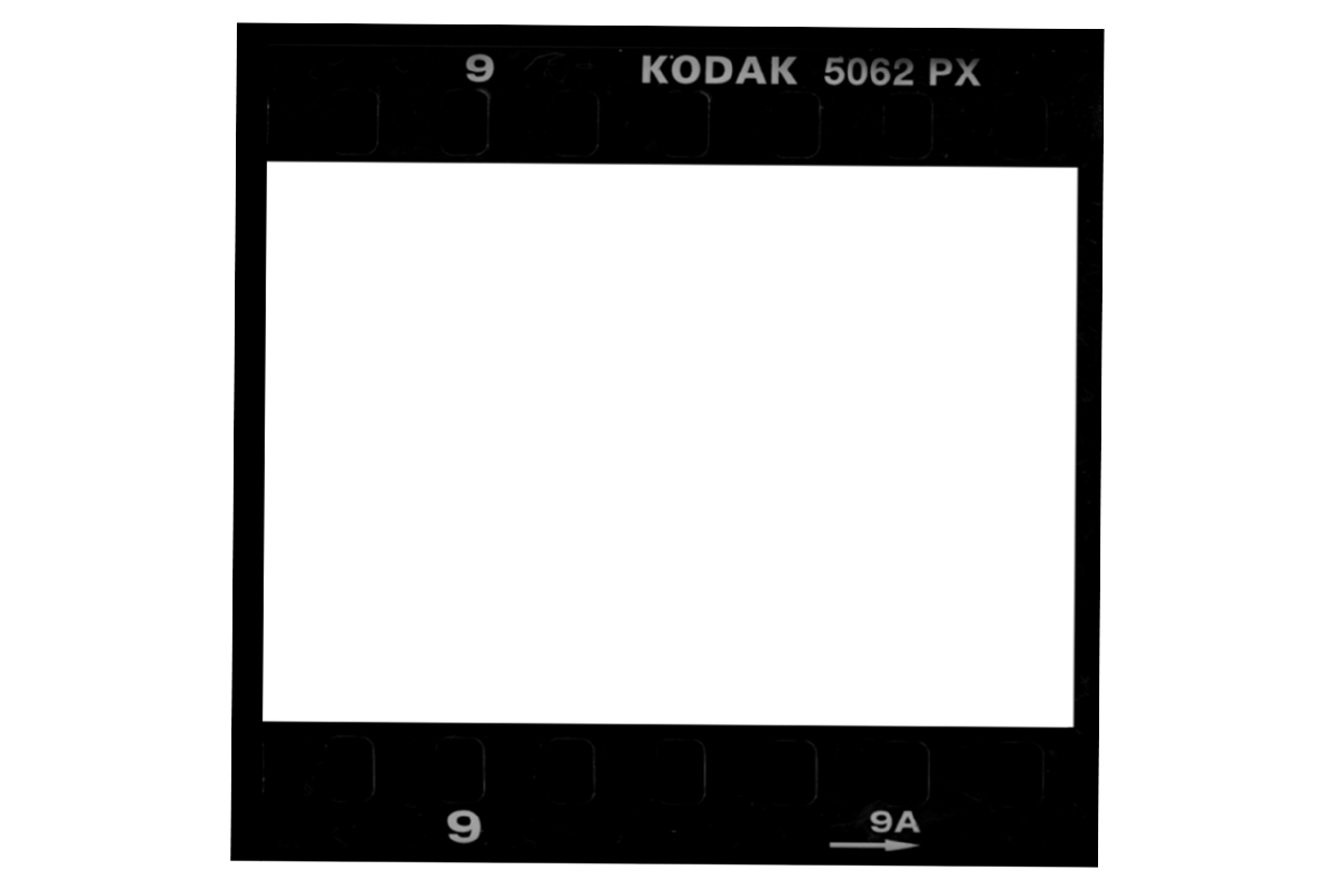 A Kodak 5062 PX slide mount with empty slide frames and film holder.