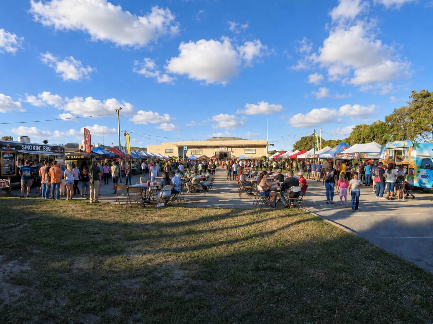 Monterey outdoor event space at the FDES Portuguese Hall of Monterey with festival vendors and guests.