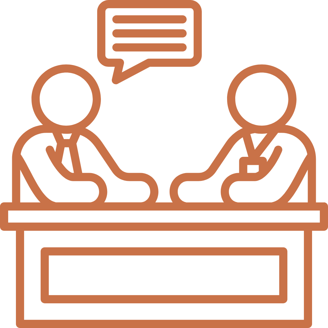 Outline illustration of two people sitting across from each other at a table, engaged in conversation, with a speech bubble above them containing lines of text.
