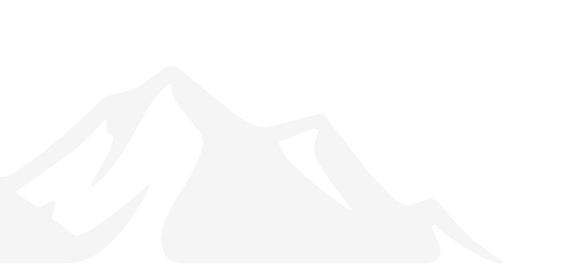 A black and white silhouette of a mountain with snow on its peaks.