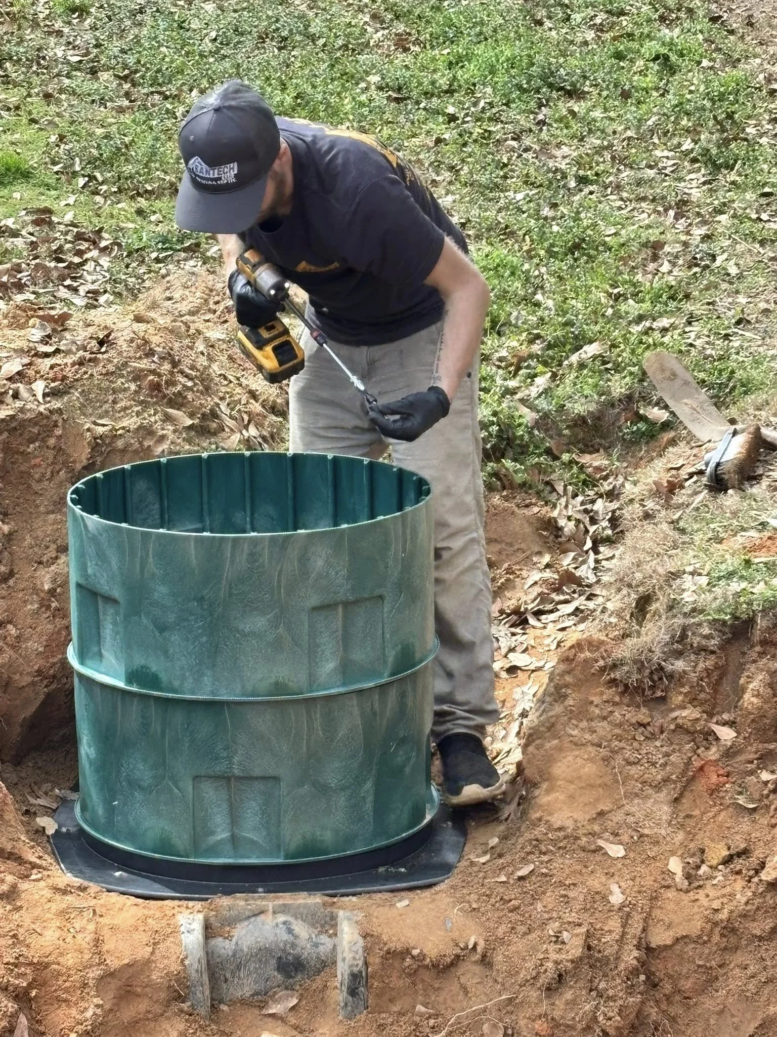 Installing a septic lid riser