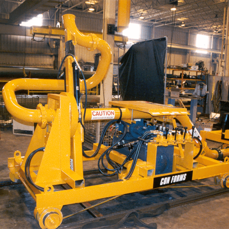a concrete placer mounted onto a railway track wheels to allow for ttravel into tunnels and placement of concrete on the walls of the tunnel