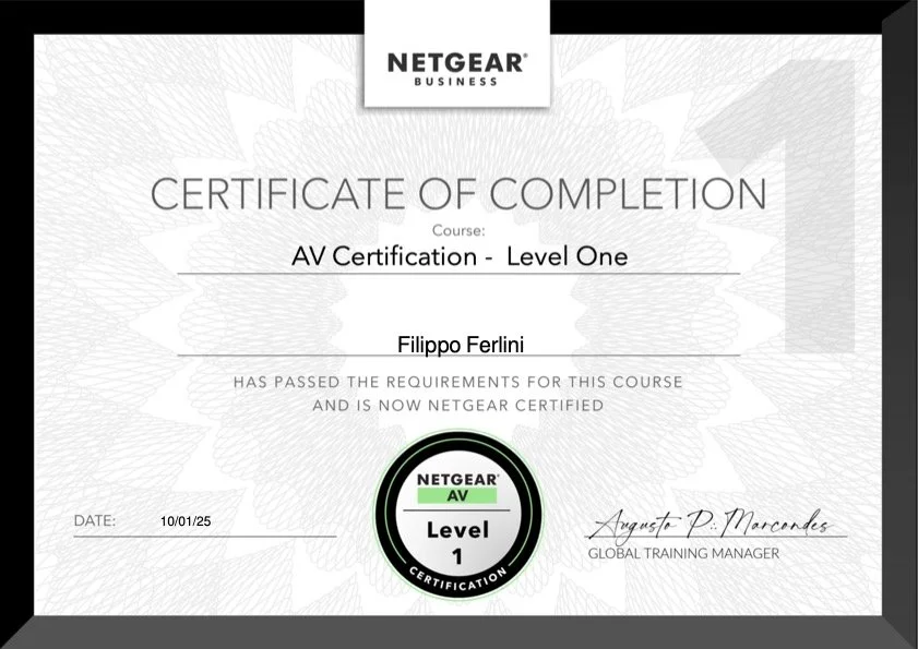 Certificate of completion for AV Certification - Level One issued to Filippo Ferlini by NETGEAR, dated 10/01/25, signed by Agosto P. Marcoles, Global Training Manager.