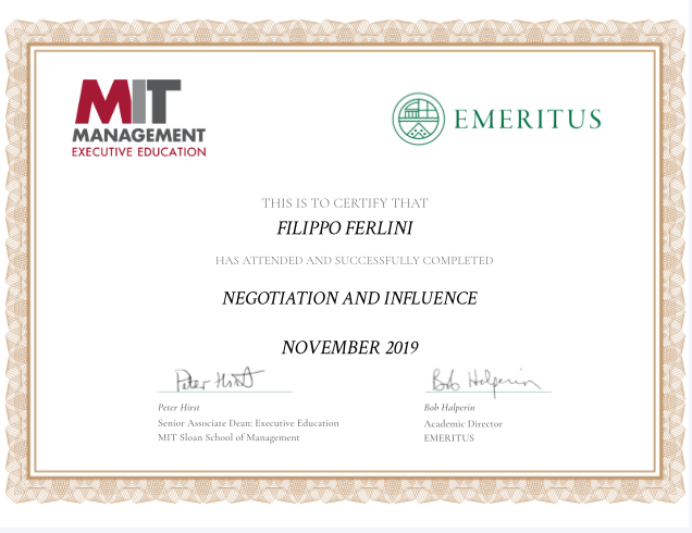 Certificate of completion from MIT Sloan School of Management, awarded to Filippo Ferlini for a course in Negotiation and Influence at Emeritus in November 2019. The certificate features logos of MIT Sloan and Emeritus, with signatures from Peter Hirst and Bob Hoffer. The border is a decorative tan-colored pattern.