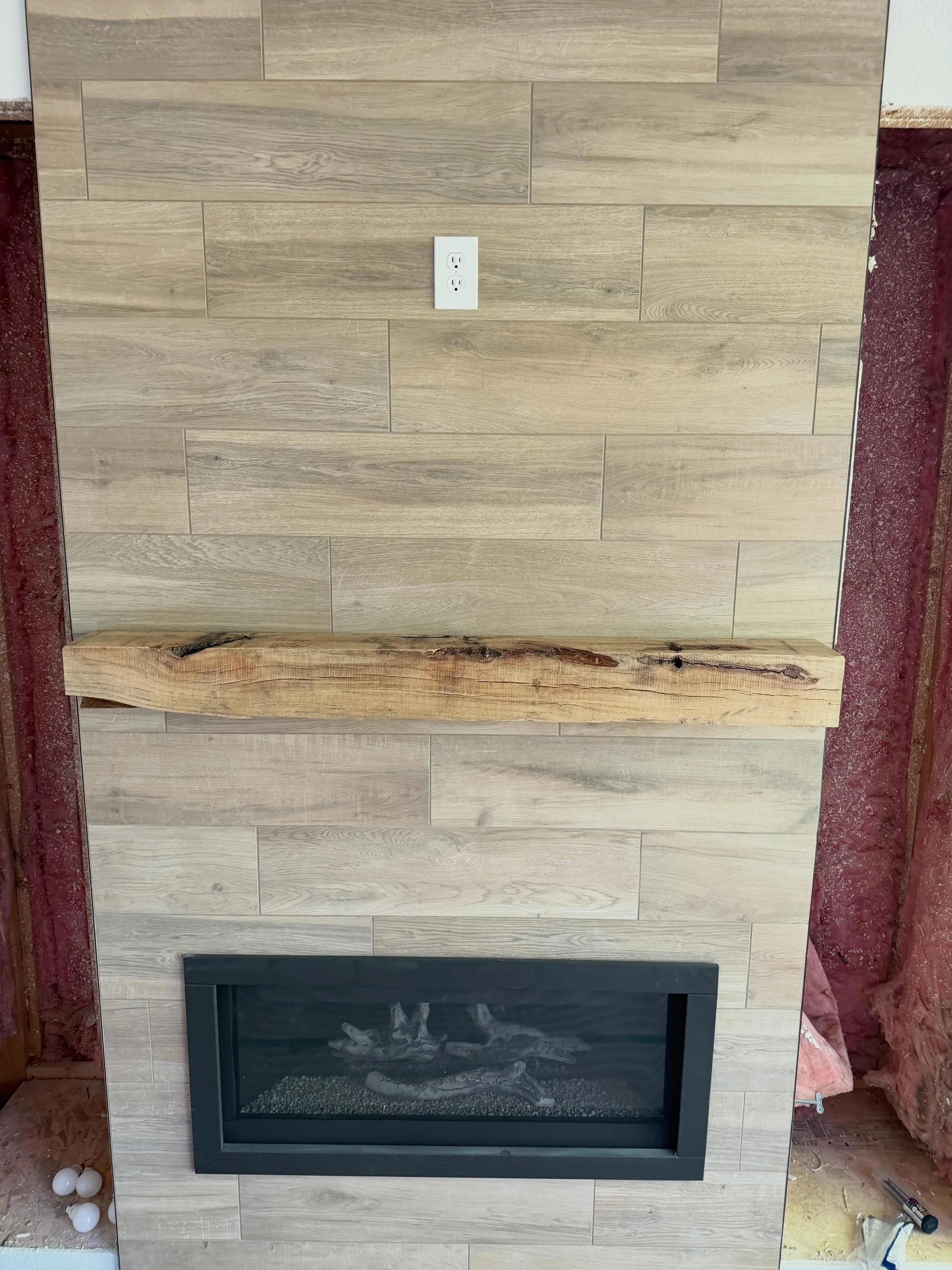 New fireplace mantel! The beam was salvaged and repurposed into this beautiful mantel. Solid white oak, with a very light sand to leave all the original markings, and finished with a couple coats of @generalfinishes satin polyurethane. 

Side note, i
