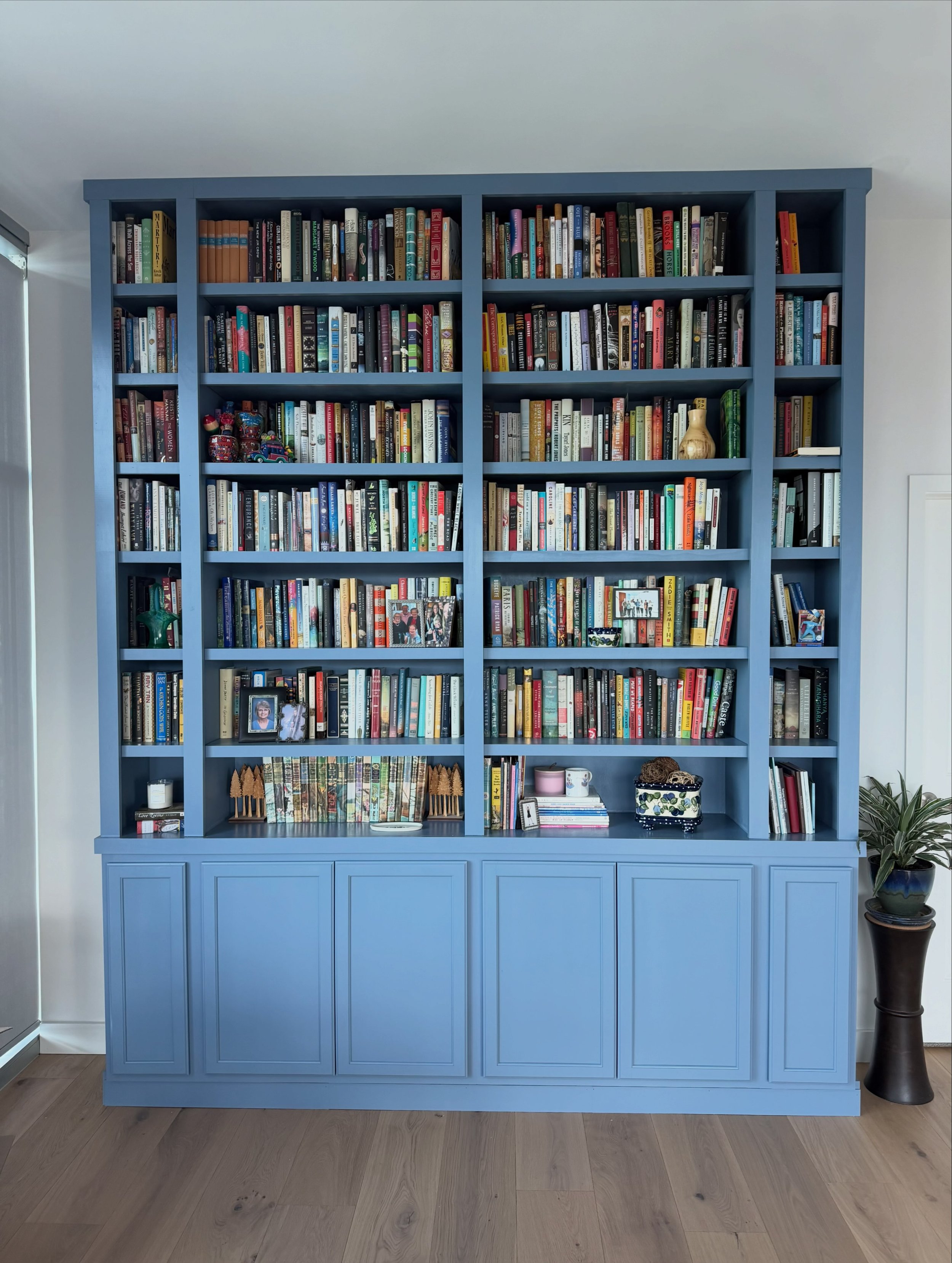 Another project in the books! This one I took over halfway from another woodworker. They chose to install upper cabinets as the base, and had the top built. I came in and built the shelving and painted it. Bookcases always look amazing when fully sta