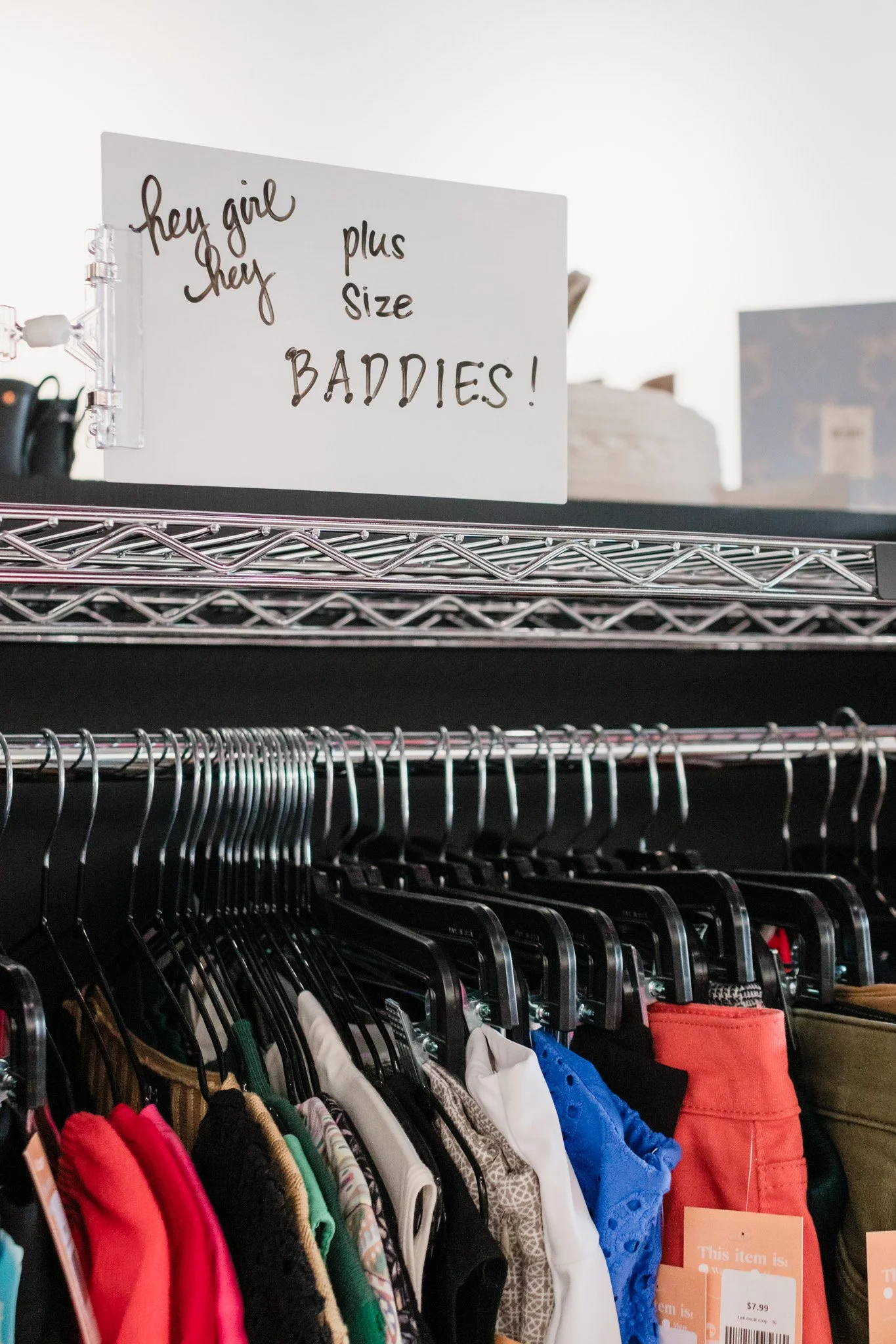 A clothing rack filled with various size, size XS to Plus sized clothing. rent a booth for the week and hang your items. consignment