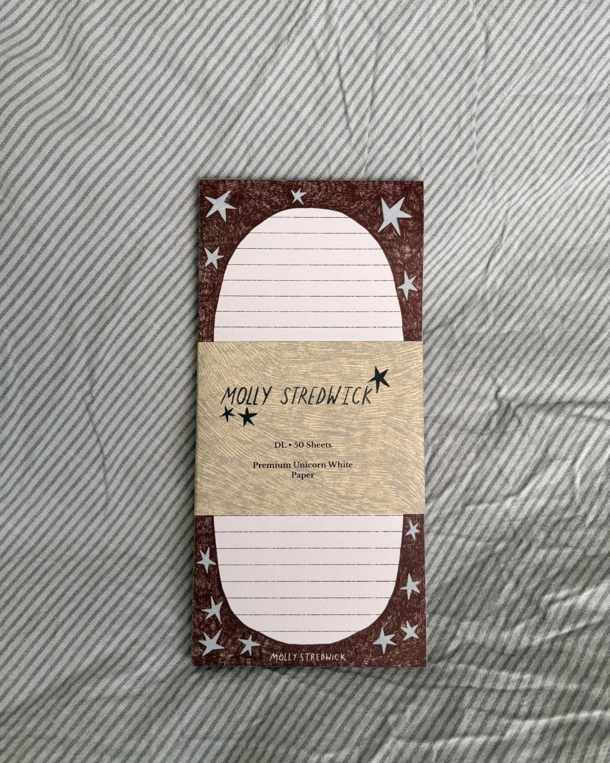 Brown Border Blue Stars DL Notepad