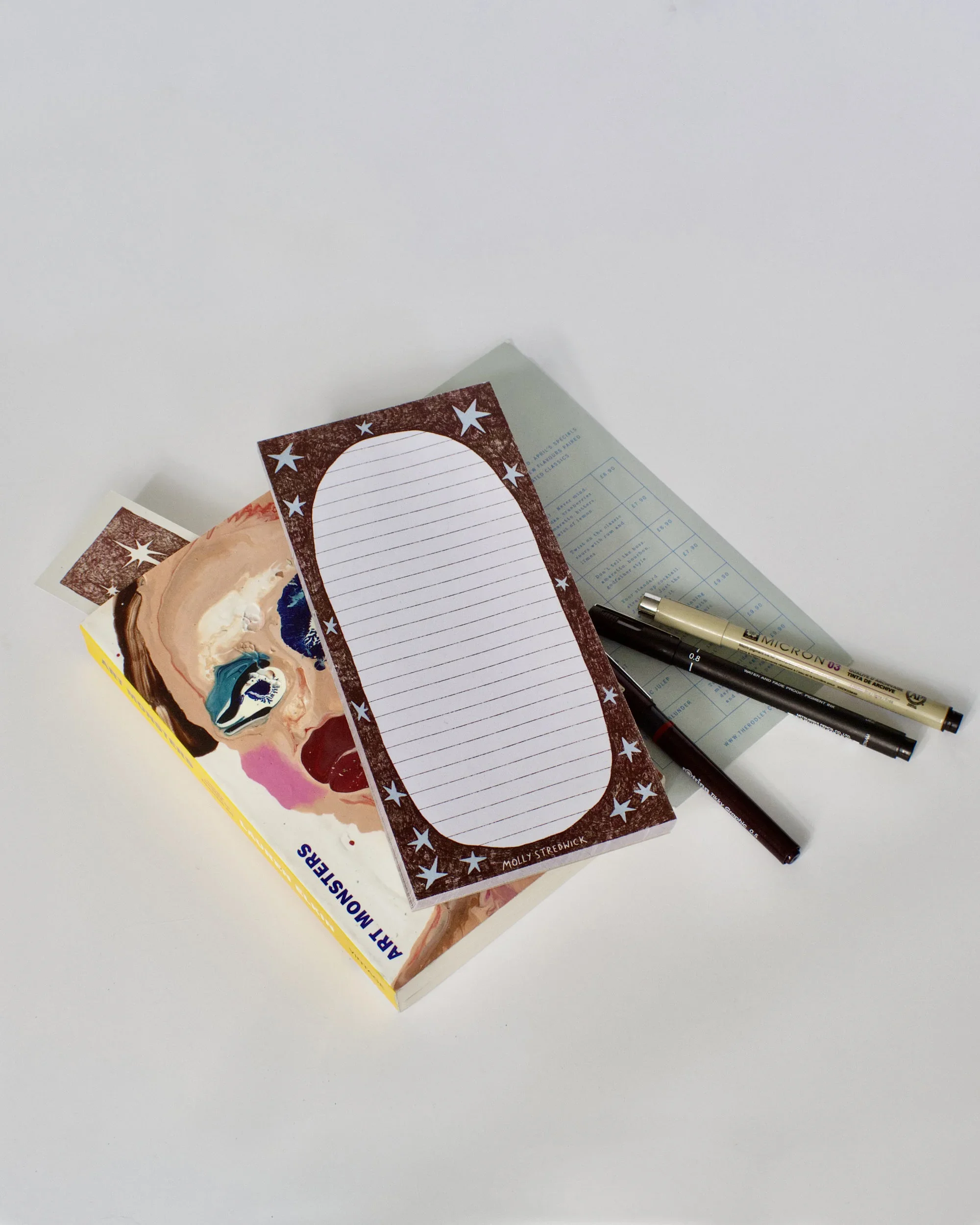 Brown Border Blue Stars DL Notepad