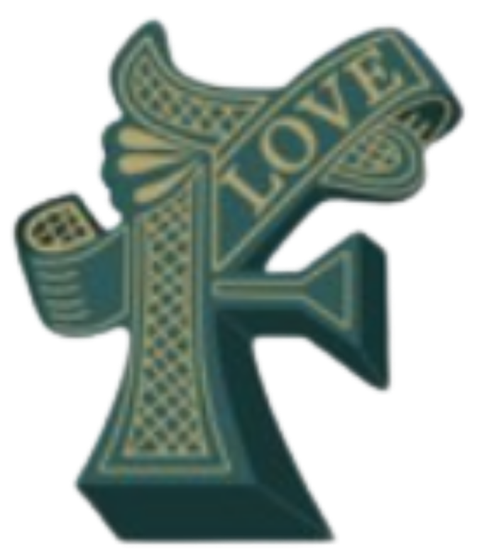 A vintage-style soap carving of the letter 'K' with the word 'LOVE' inscribed on it.