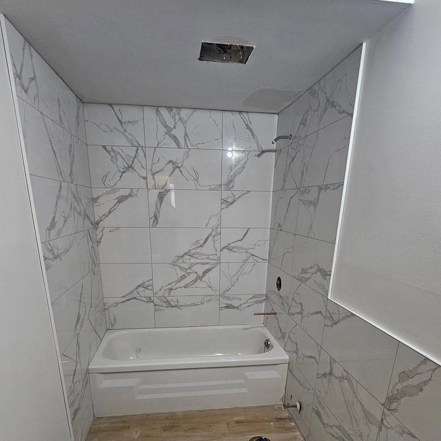 Altl Construction 🚧 installed a tub and now desire full tile walls no more tub soround...