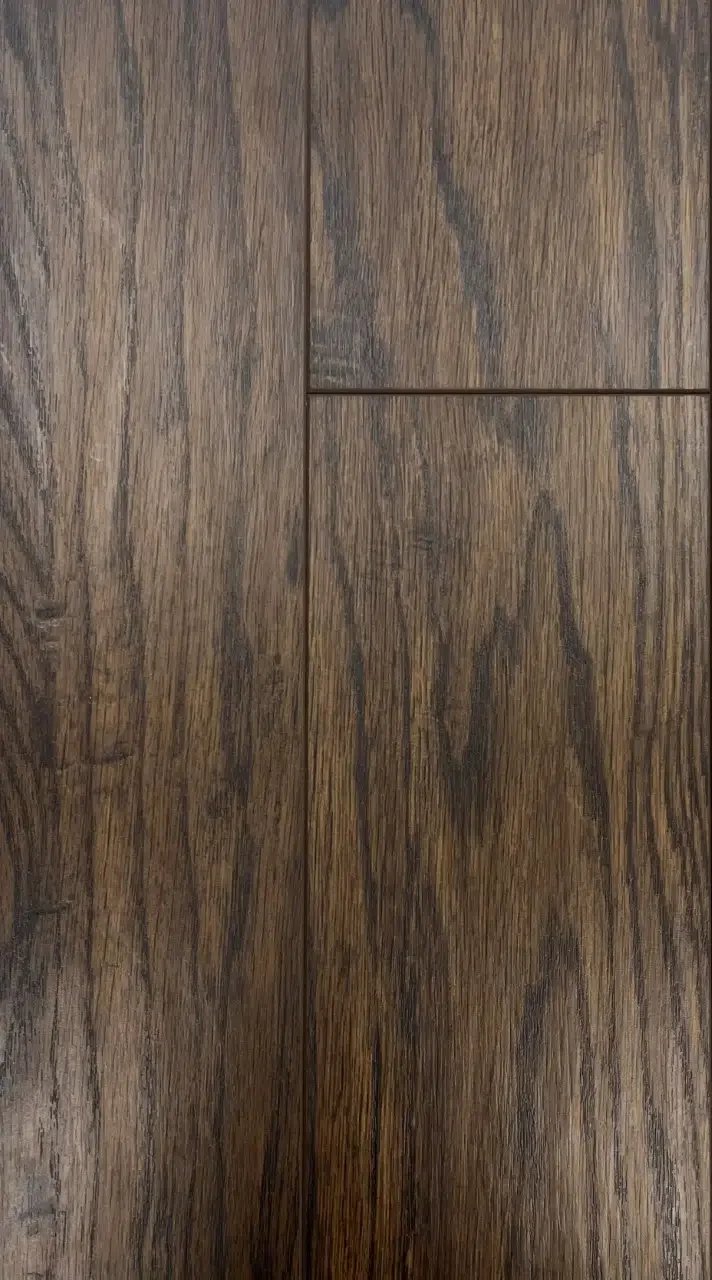 Close-up of a wooden floor with visible grain patterns and a satin finish.