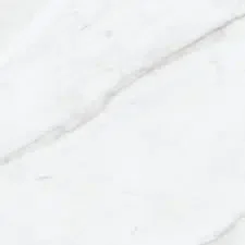 Close-up of a white marble surface with subtle gray veining.