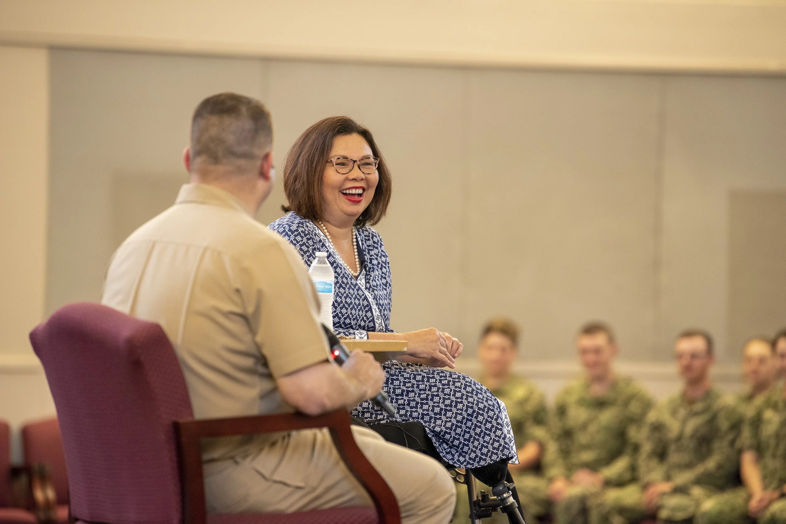 Sen. Tammy Duckworth, of Illinois, is interviewed by Command Master Chief David Twiford, command master chief of Recruit Training Command (RTC), about her experiences during an RTC Sailor 360 training. 