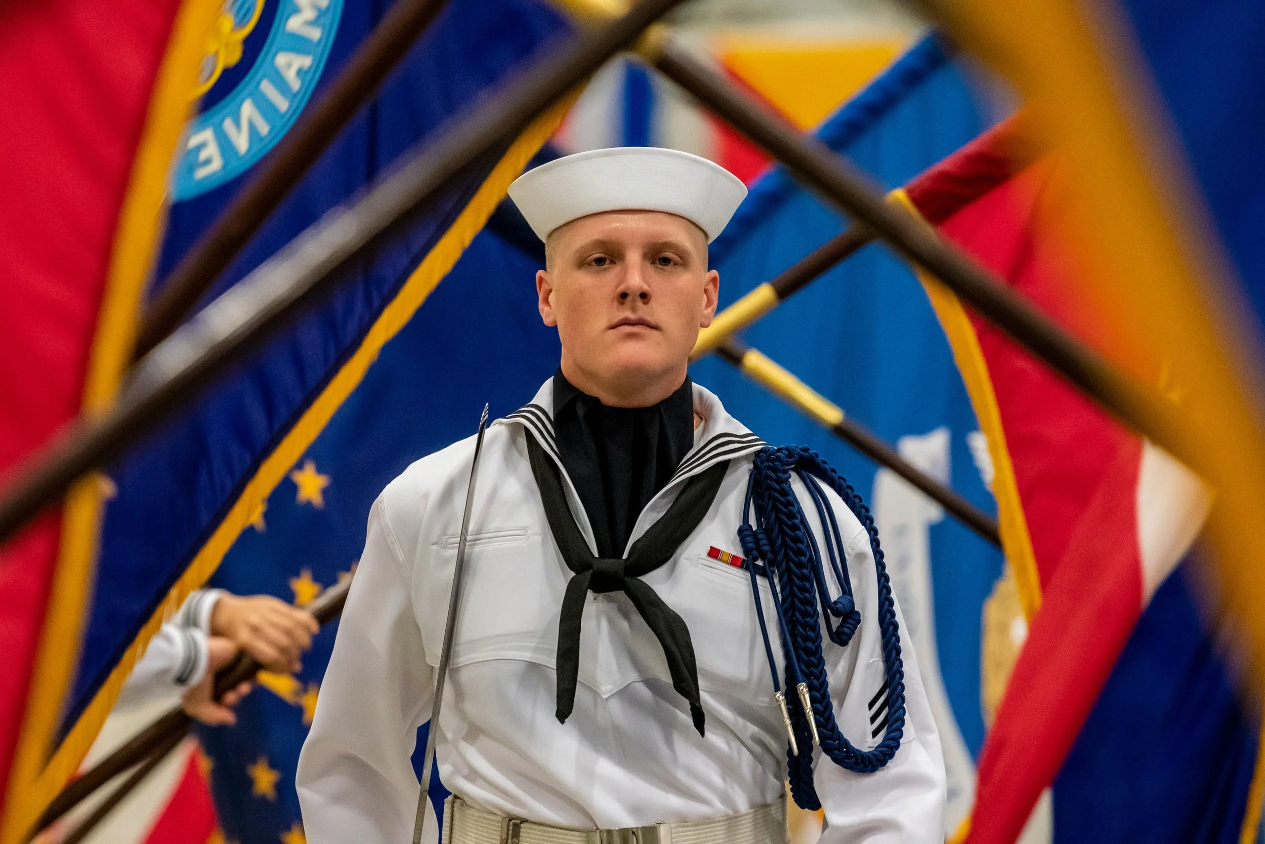 A graduating Sailor performs during a pass-in-review graduation ceremony at Recruit Training Command. More than 35,000 recruits train annually at the Navy's only boot camp. 