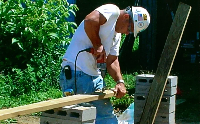 LeChase Site Supervisor Ed Polle takes a hands-on approach to supervising the building construction.