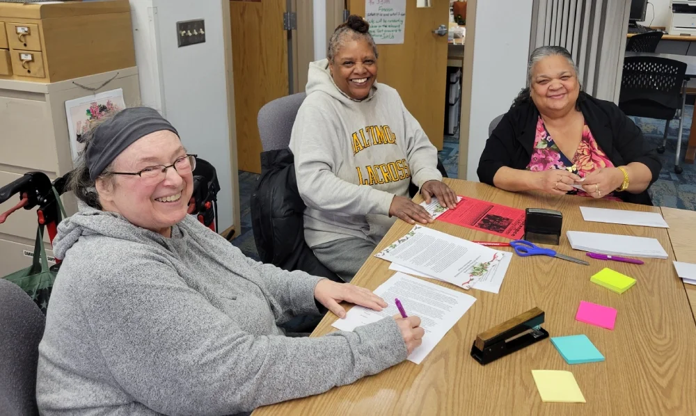 Volunteers conducting a mailout