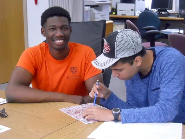 Volunteers studying a map