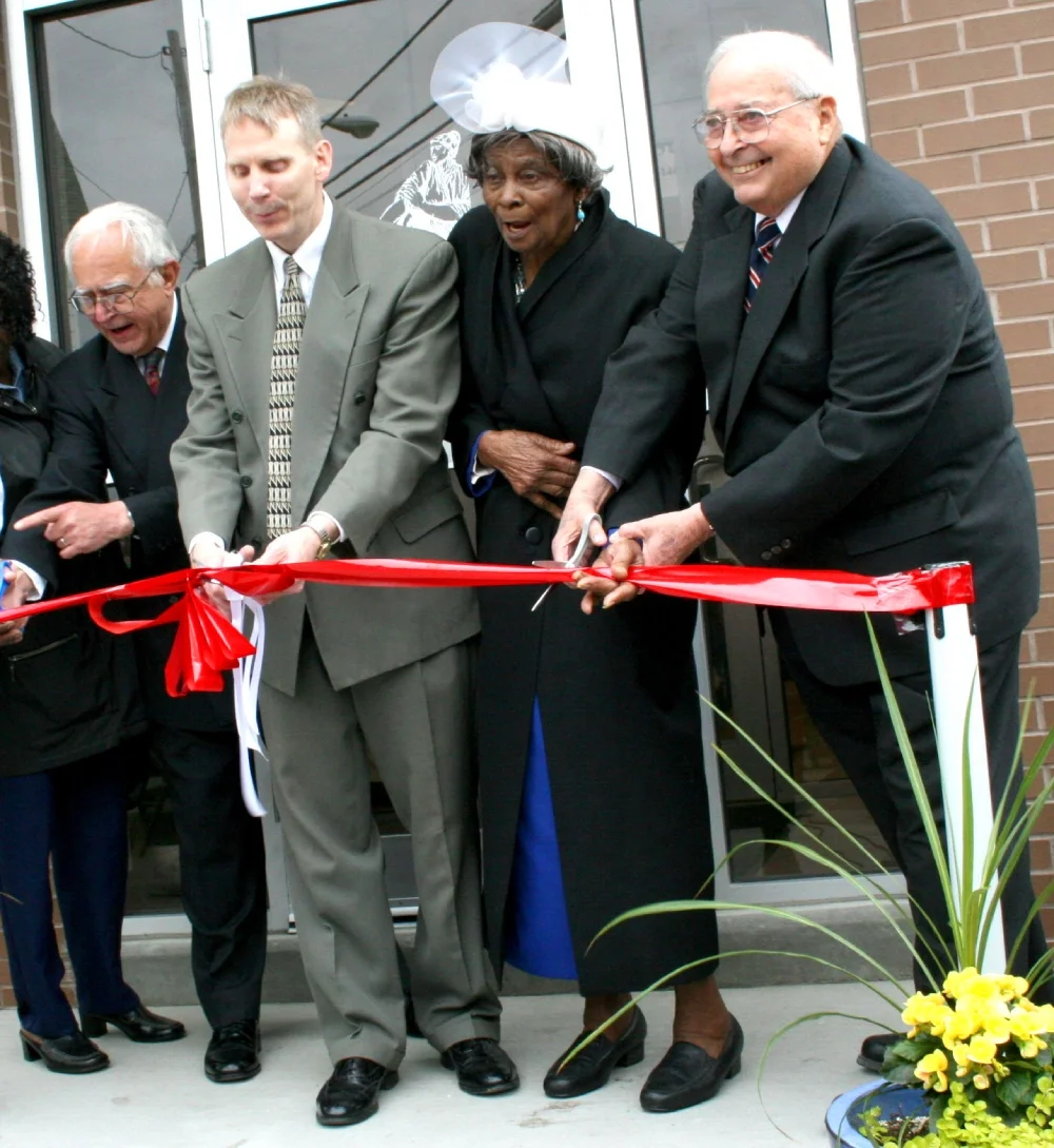 The ribbon cutting ceremony (from left to right): Volunteer architect Pete Romeo, ESWA Advisory Committee President Mark Horn, founding ESWA member Pankie Hines and ESWA Advisory Committee member Bob Malley.