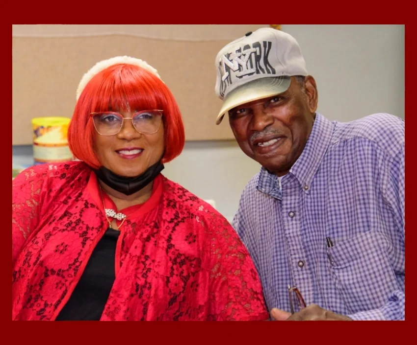 A woman and man dressed up for an event