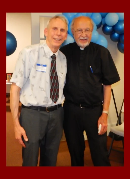 ESWA volunteer with a priest