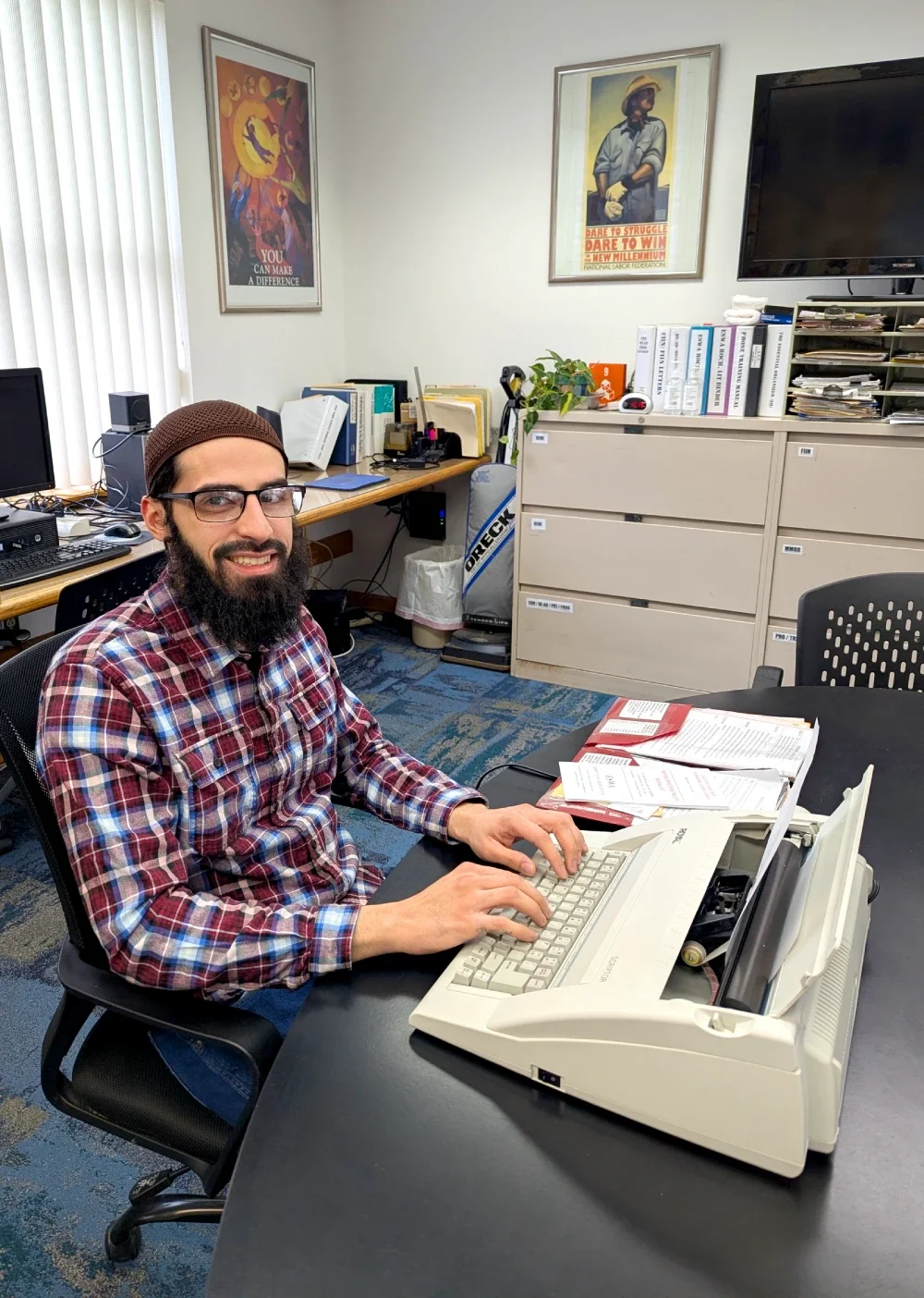 ESWA volunteer typing