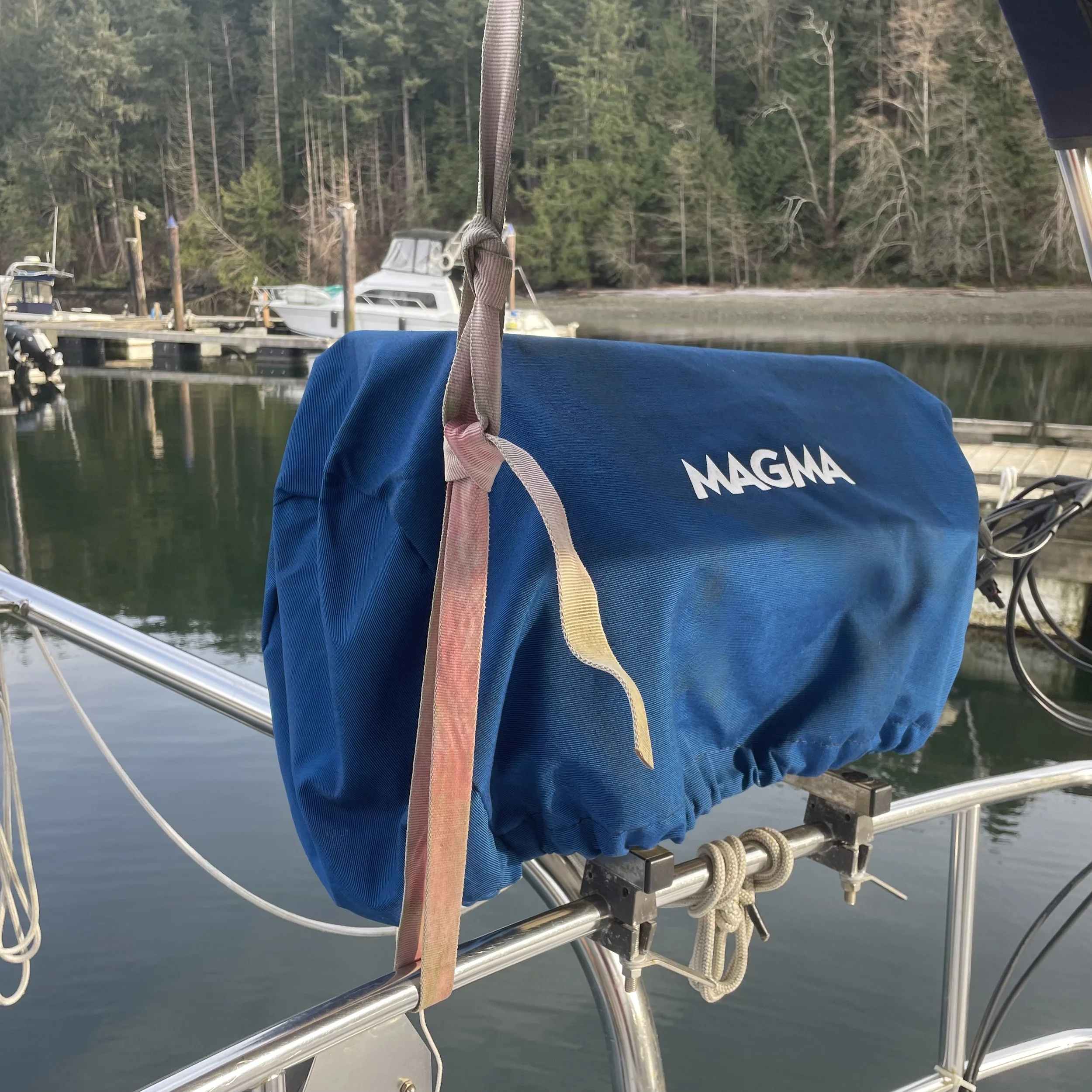 Magma BBQ grill takes either green propane bottle or can be run from the 10 lb. tank in the rear propane locker. Selling separately