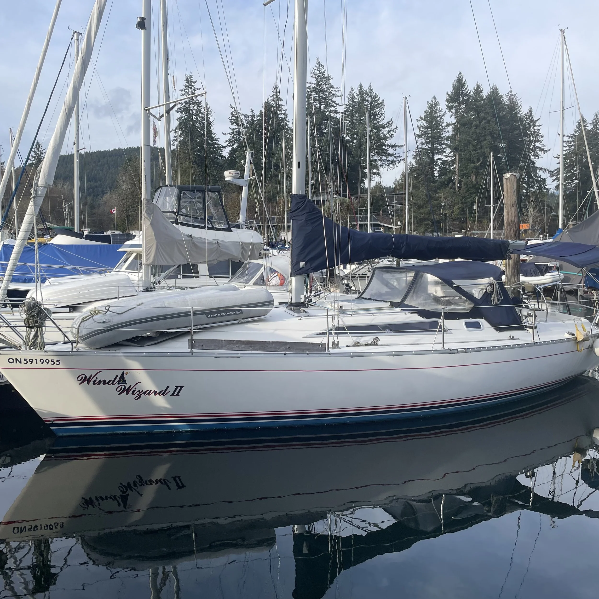 Wind Wizard II is a sloop rig with a 150% genoa on a Harken furler, fully battened main, and she carries a 100% jib and gennaker. She has a masthead rig with stainless rod standing rigging, with a hydraulic controlled back stay. Canvas includes a sai