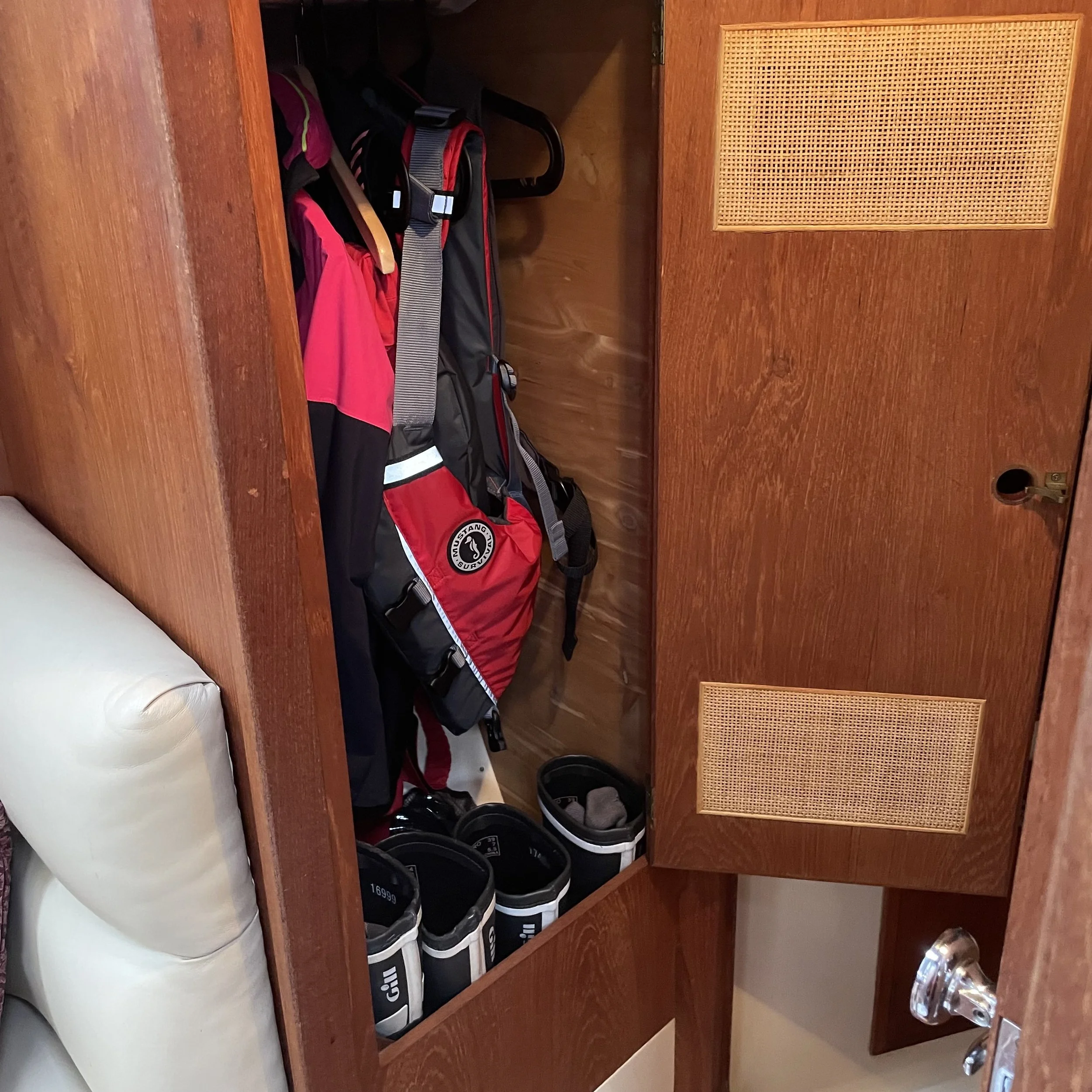 Generous hanging locker opposite the head.