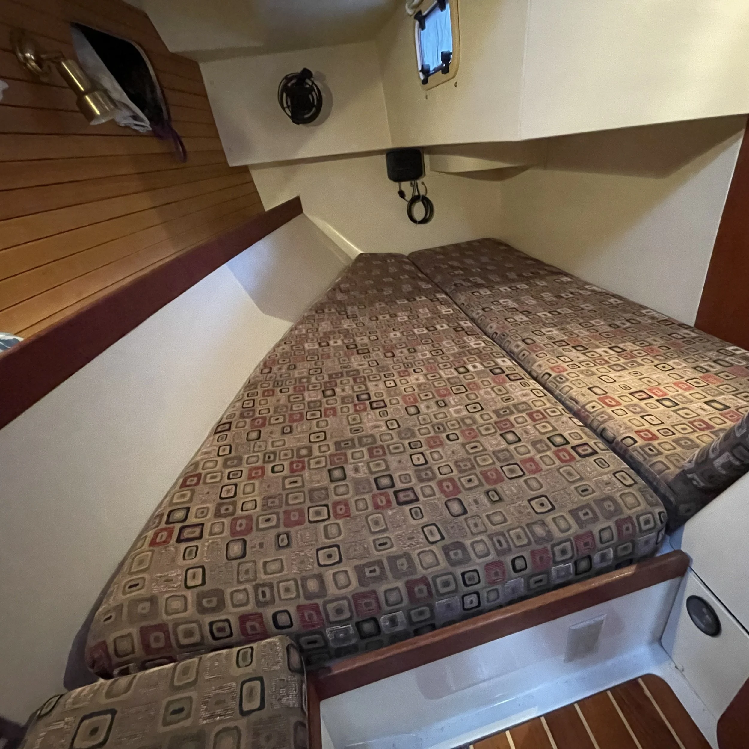 Rear starboard cabin has queen-size room at the shoulders and good cross ventilation. 