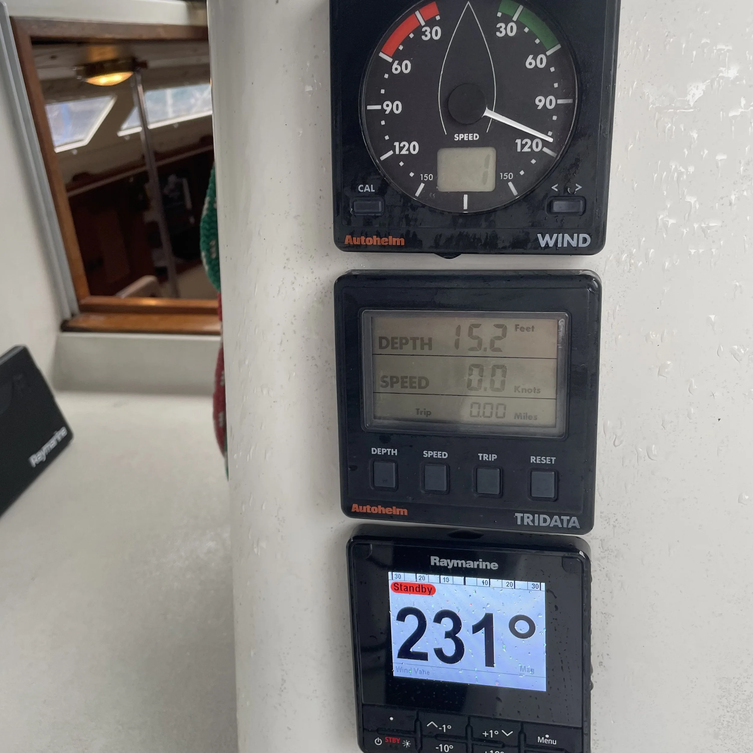 Windex, speedo, depth and autopilot instruments. The latter enables a solo sailor to fully operate the boat from behind the dodger.