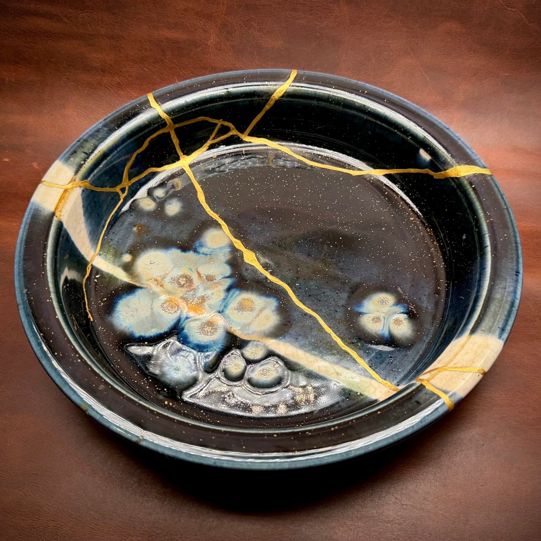 This pie plate arrived in my studio thanks to an incredibly caring friend.

After the plate was accidentally dropped by its owner during a visit, her friend carefully collected the pieces and sought out ways to have it repaired as a surprise. I thoug