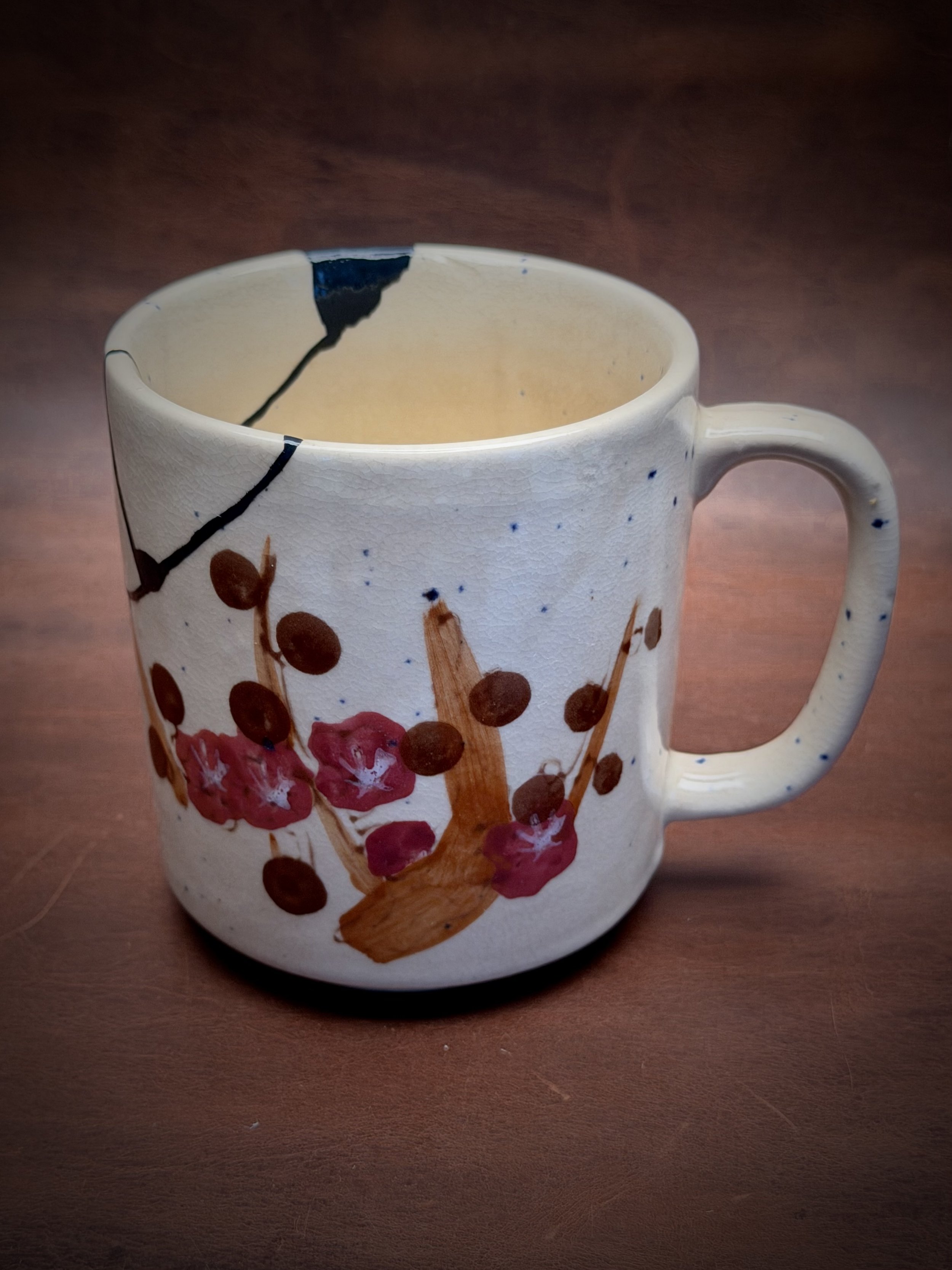 This small mug belongs to a friend of mine, and was purchased locally here in Portland from one of my favorite stores, @tinybramblesshop. It was made in Korea, and I love its soft, almost watercolor-like decoration and the tiny blue speckles scattere